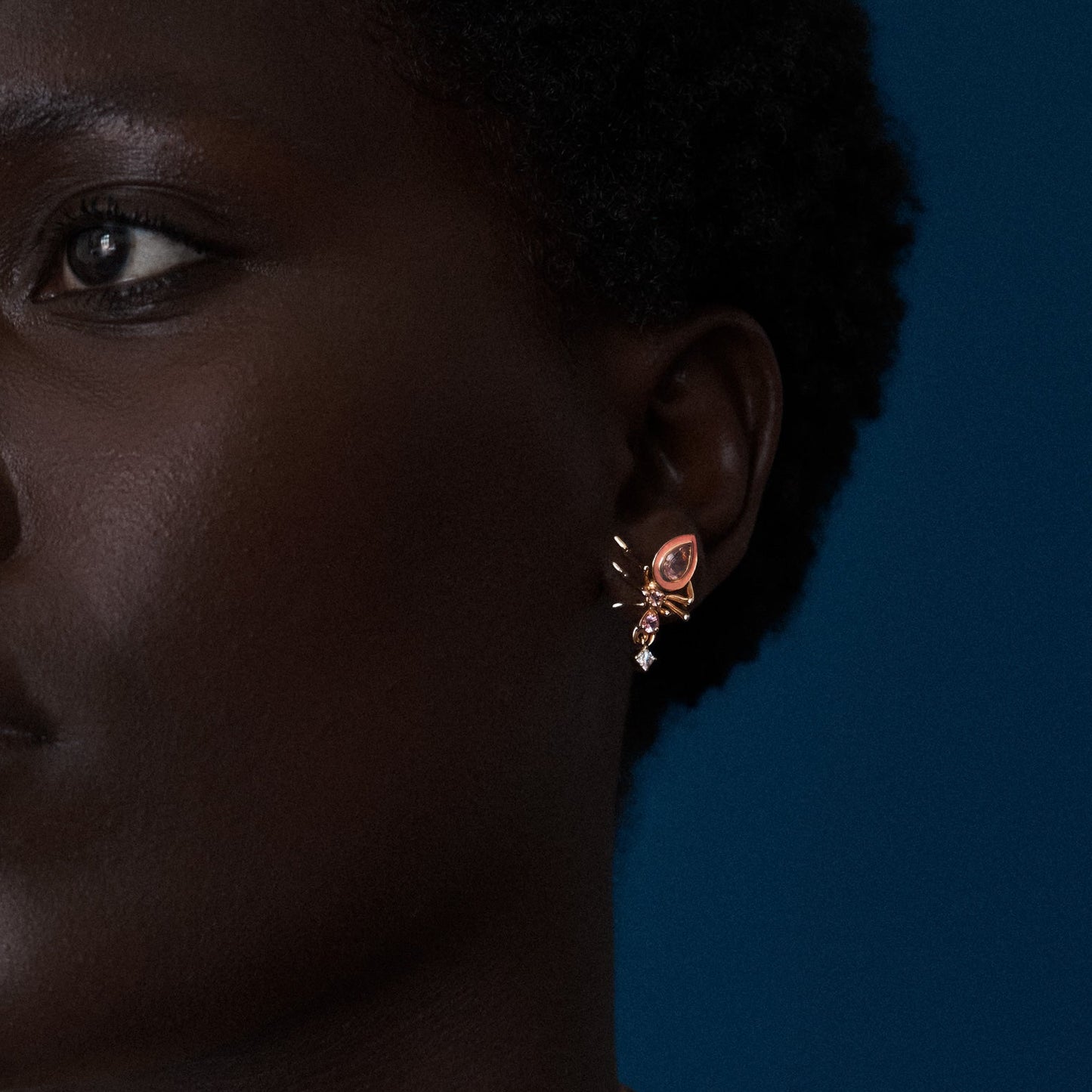 Model wearing Ojukokoro choker necklace, yellow gold vermeil with aquamarine gemstones, Cocoerow