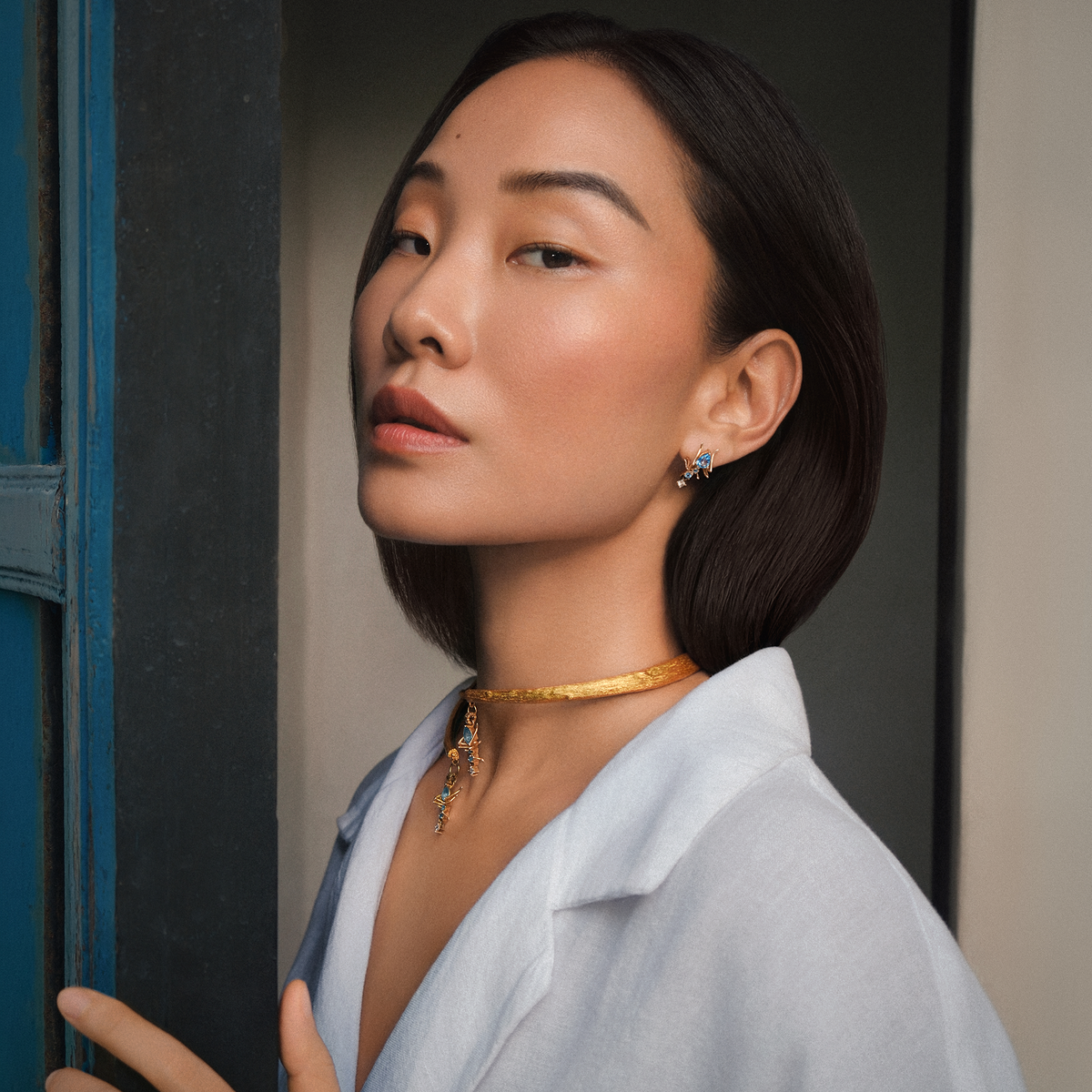model wearing Cocoerow fine jewelry tree choker with Kokoro Aquamarine Pendants