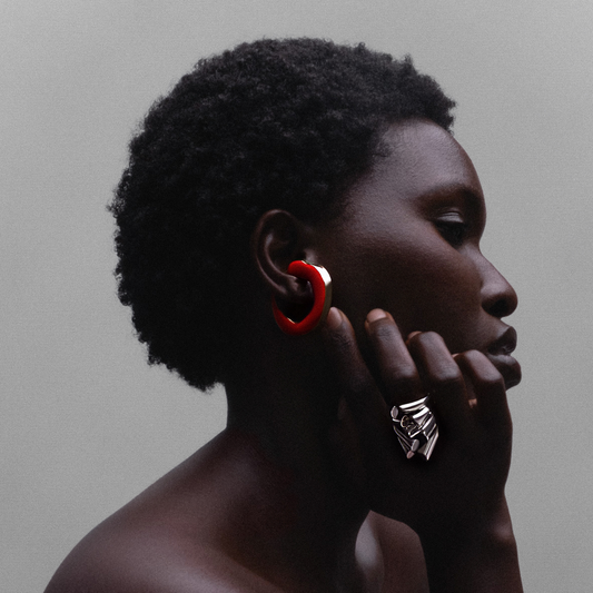 Model wearing Cocoerow Cayenne Ear Cuff in gold with diamonds