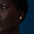 Model wearing Ojukokoro choker necklace, yellow gold vermeil with aquamarine gemstones, Cocoerow